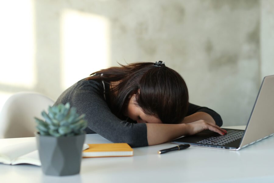 Featured Image showing Woman at office